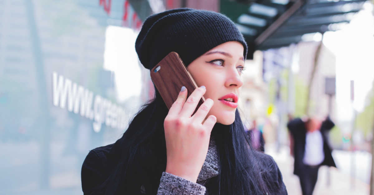 Young woman talking on her mobile phone
