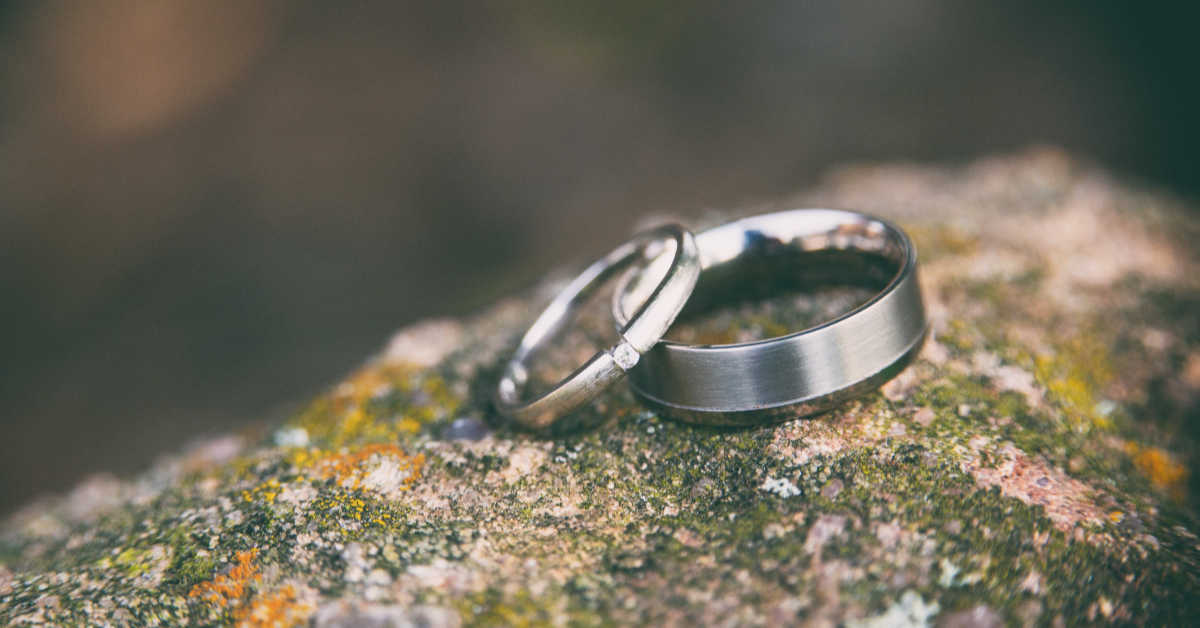 wedding rings on a rock