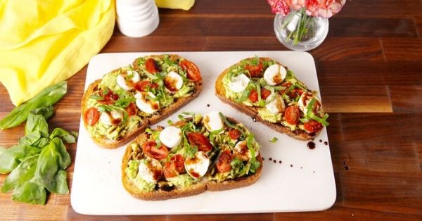 photo shows caprese avocado on toast