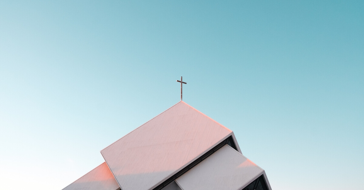 a cross on a church roof