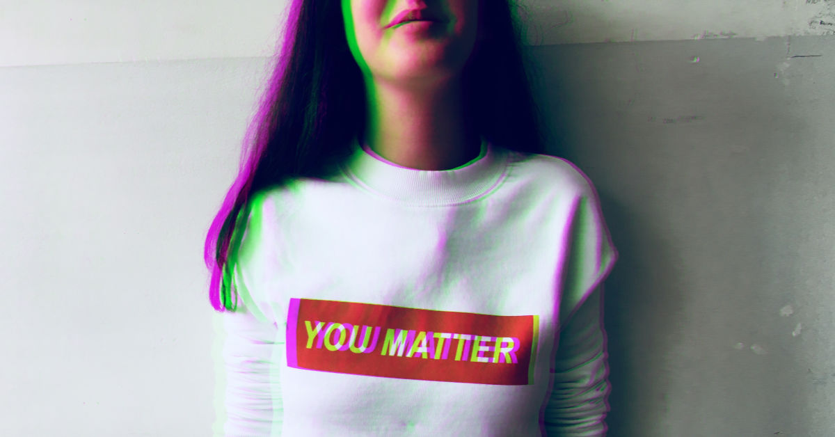 girl wearing 'you matter' shirt