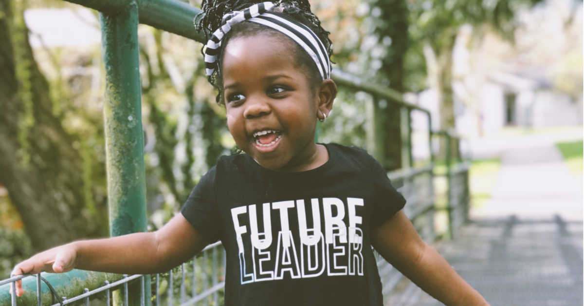 Girl wearing 'future leader' shirt