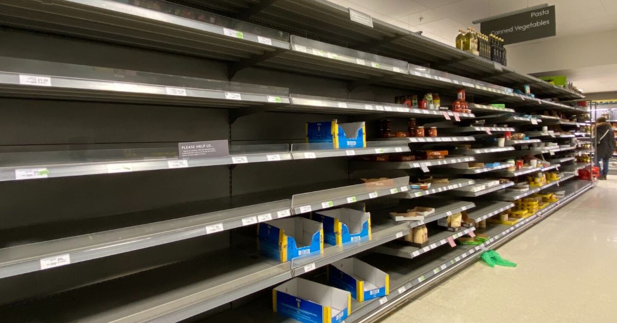 photo of empty supermarket shelves due to coronavirus panic buying