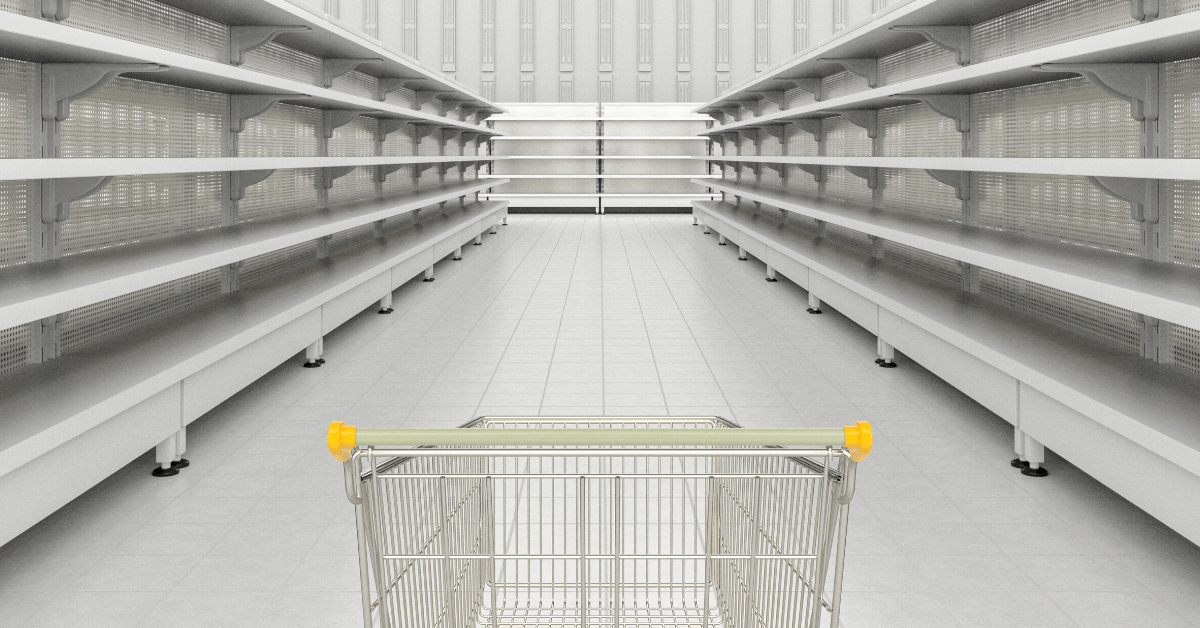 trolley point of view looking out at empty shelves in a supermarket, coronavirus