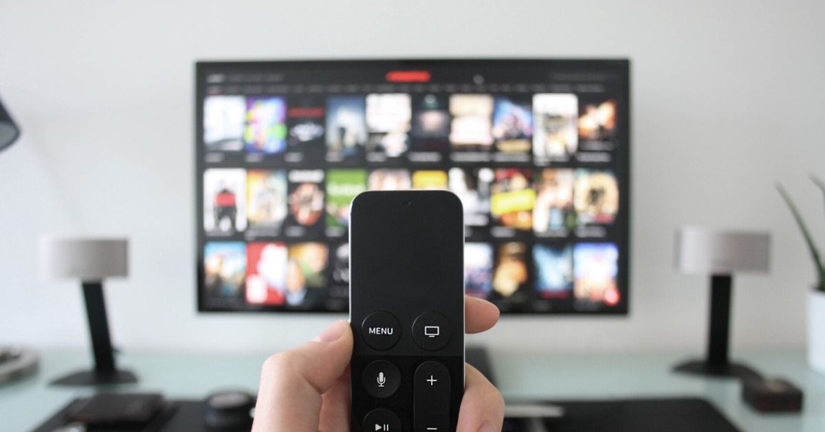 photo of a t remote in front of a tv