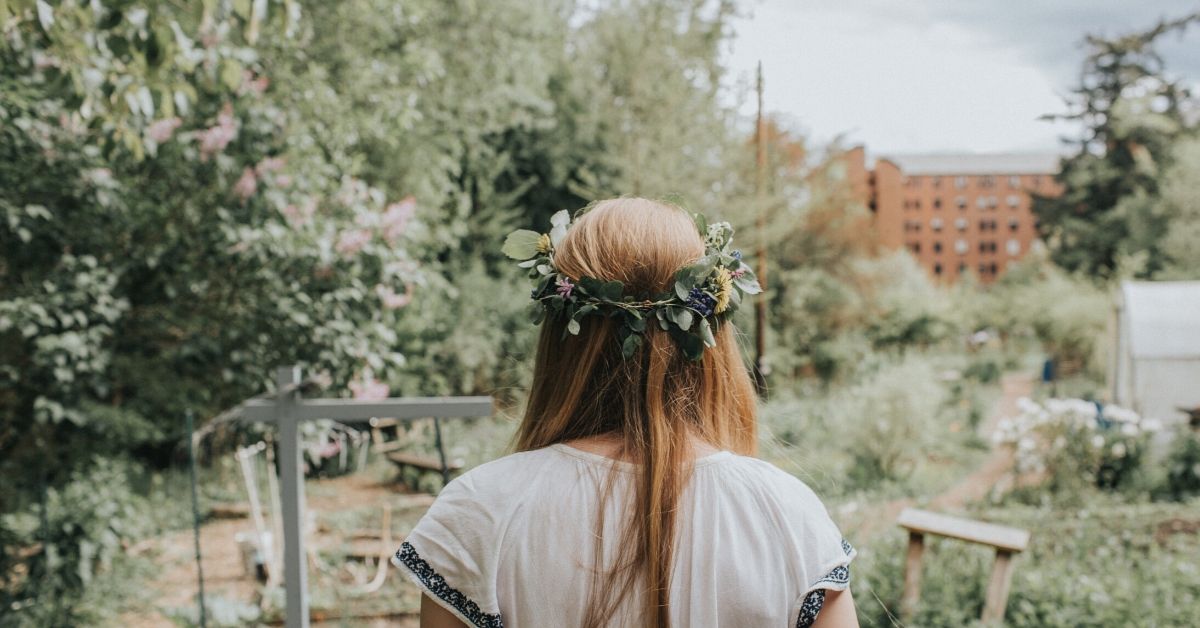 photo of the back of a girl wearing a flower crown