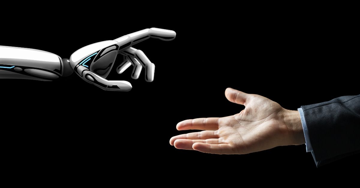 robot hand reaching out to a human hand