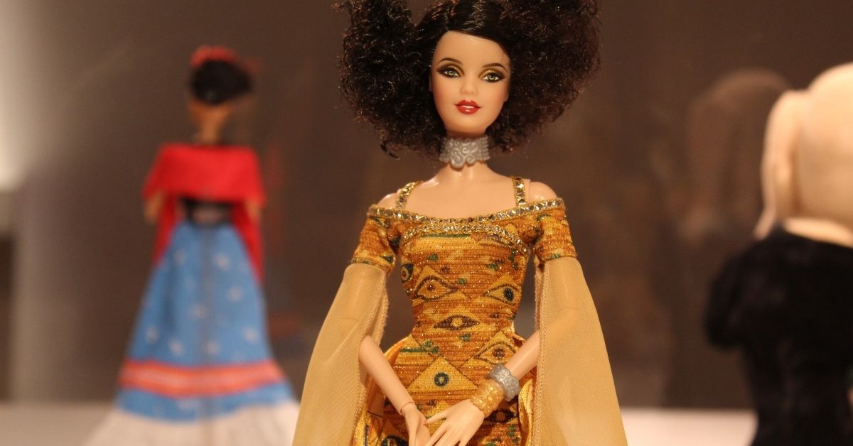 fashion dolls on a mock runway