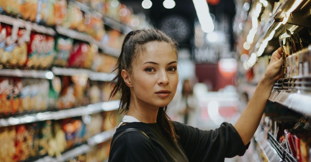 Woman Grocery Shopping by Joshua Rawson-Harris