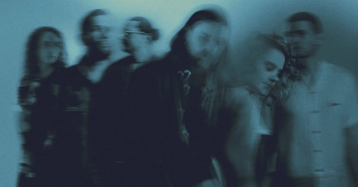 Blurred blue image of musicians from Hillsong United