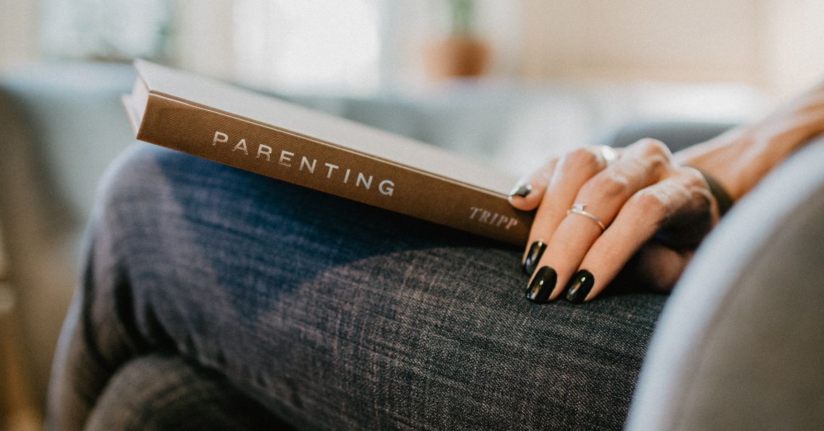 Woman with parenting book