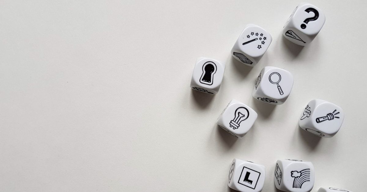 Black and white dice with symbols