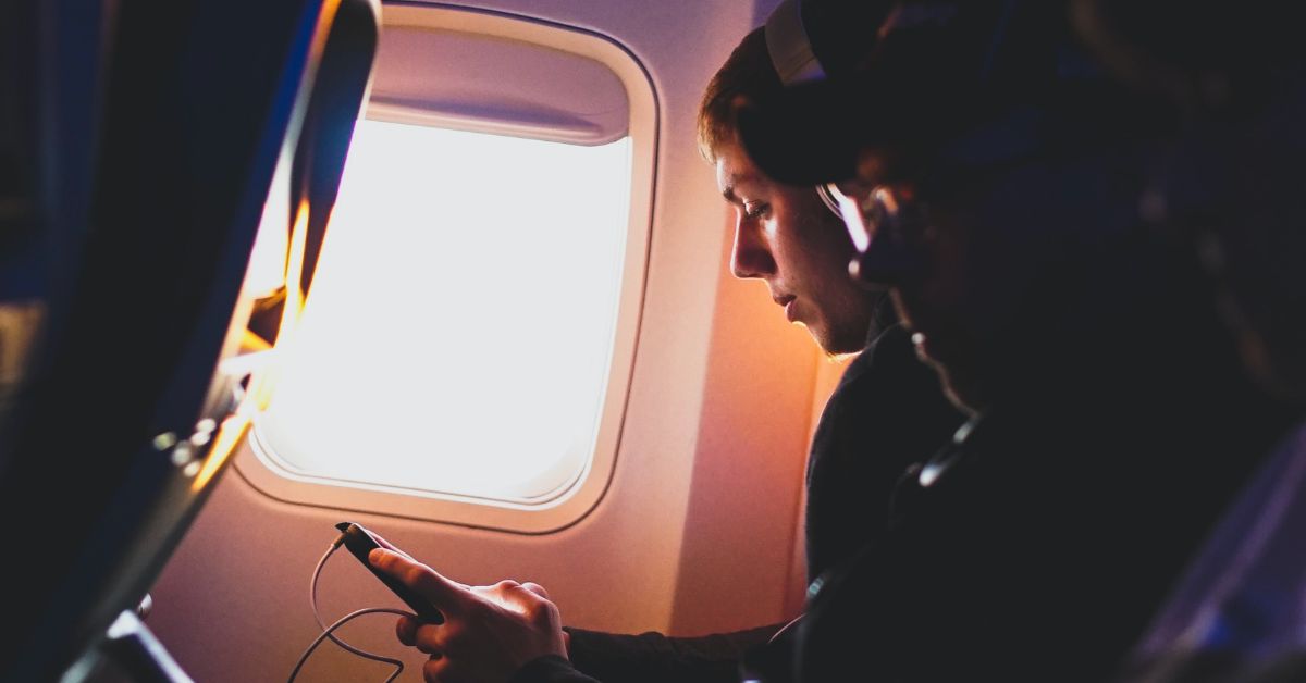 Young man on a plane