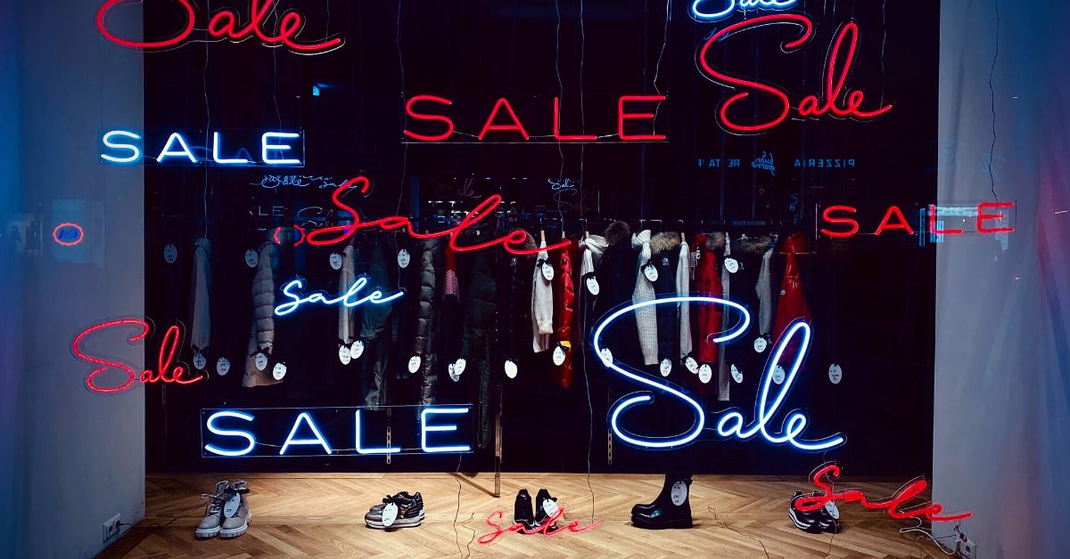 Fashion store with Sale signs in window