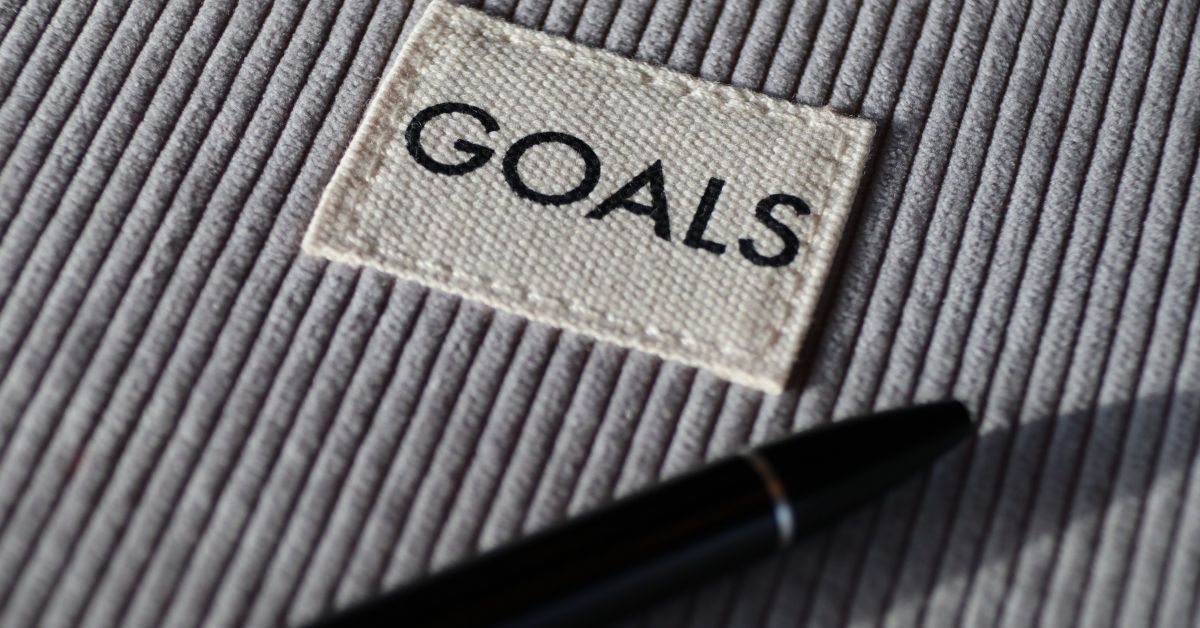 Goals journal and pen