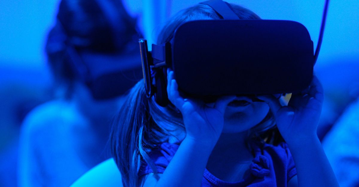 Young child wearing VR headset