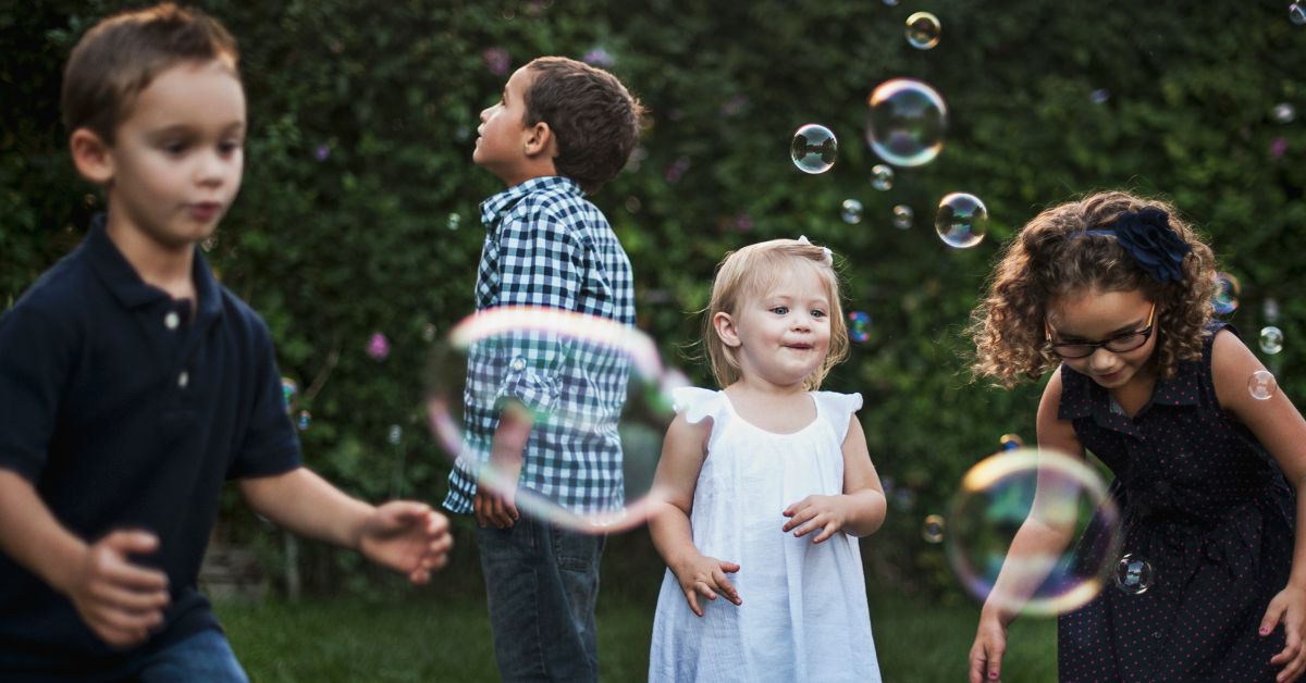 Kids playing bubbles