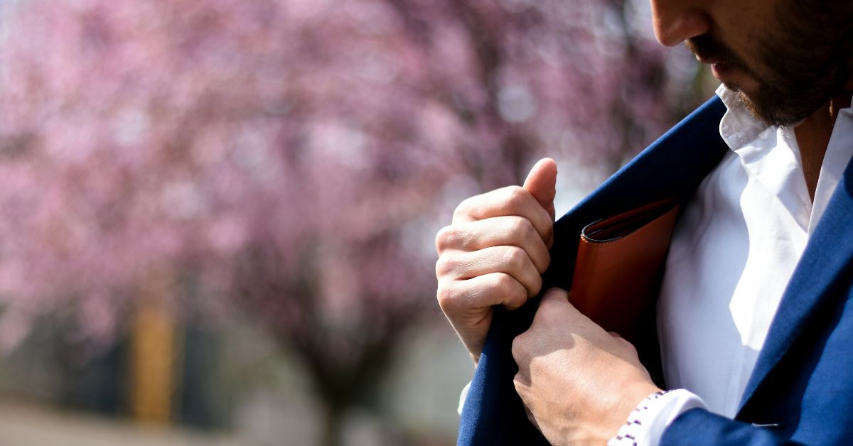 Man reaching for wallet