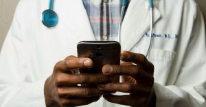 Doctor with a smartphone